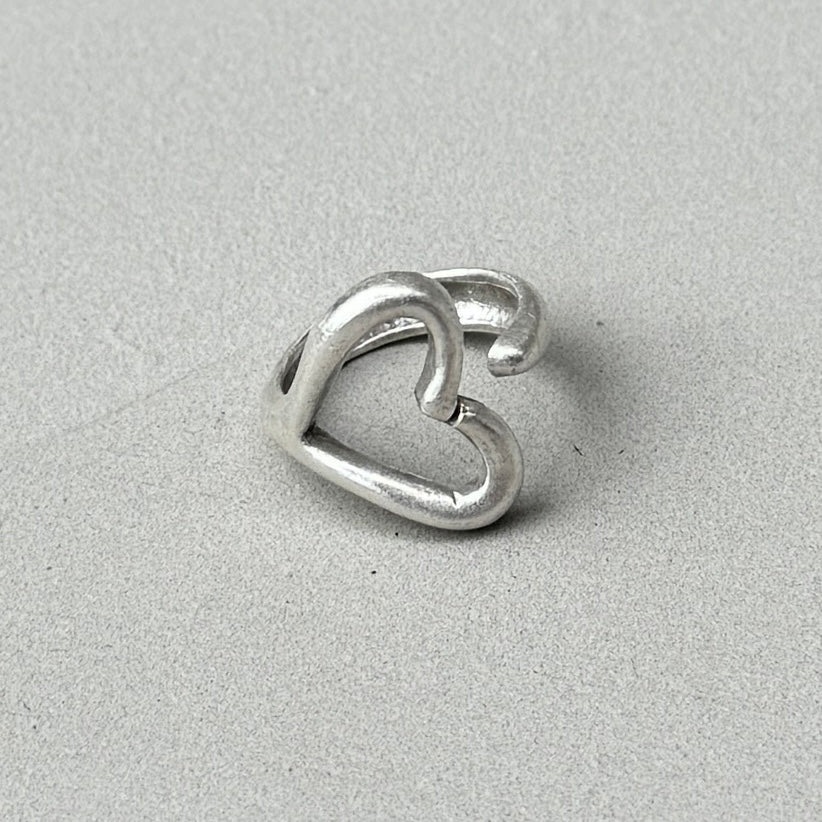 photo of an minimalist heart elsa peretti style silver ring