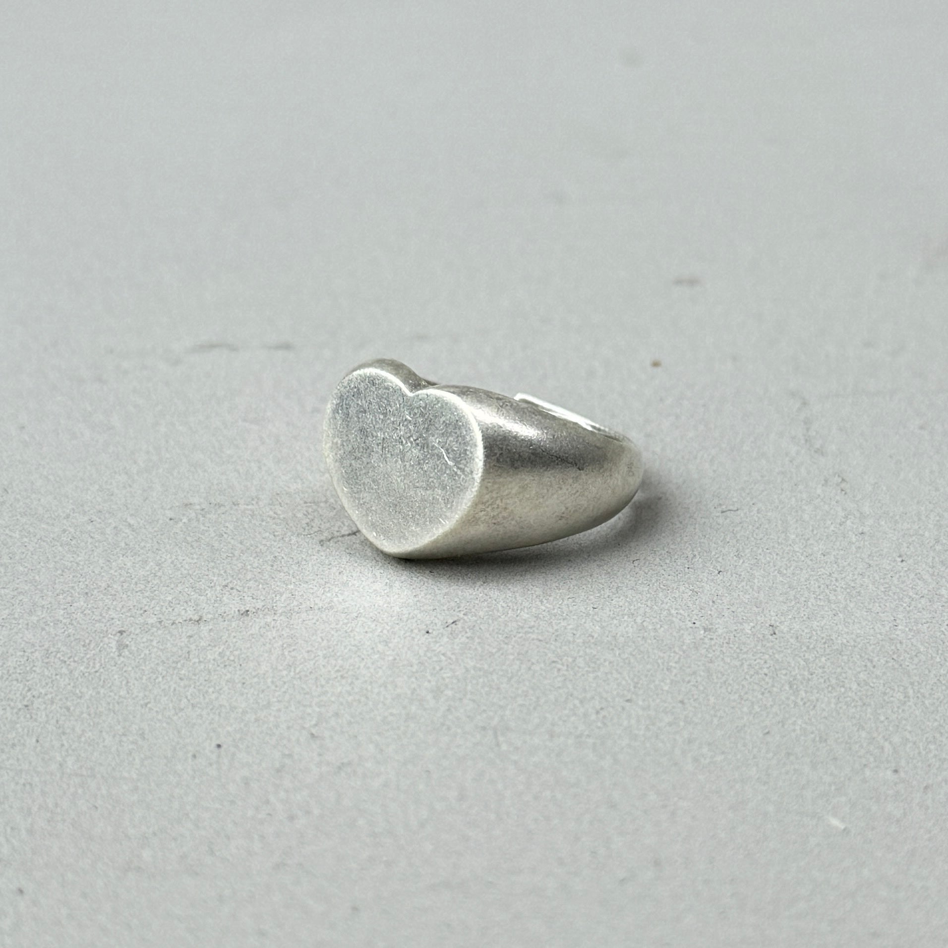 heart shaped silver ring, with a vintage silver look and adjustable back closure