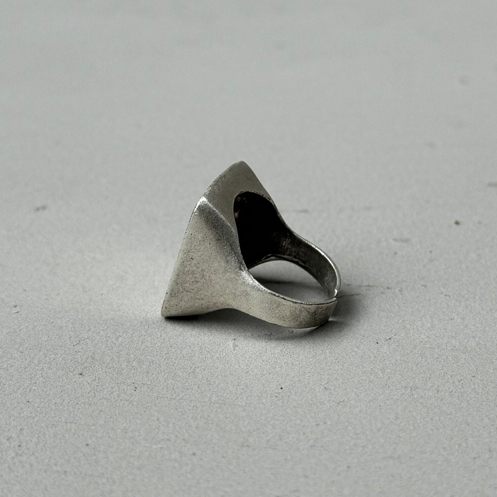 the back of a silver ring